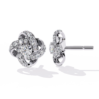 Encantadores aretes con diamantes cultivados en laboratorio y diseño floral en espiral