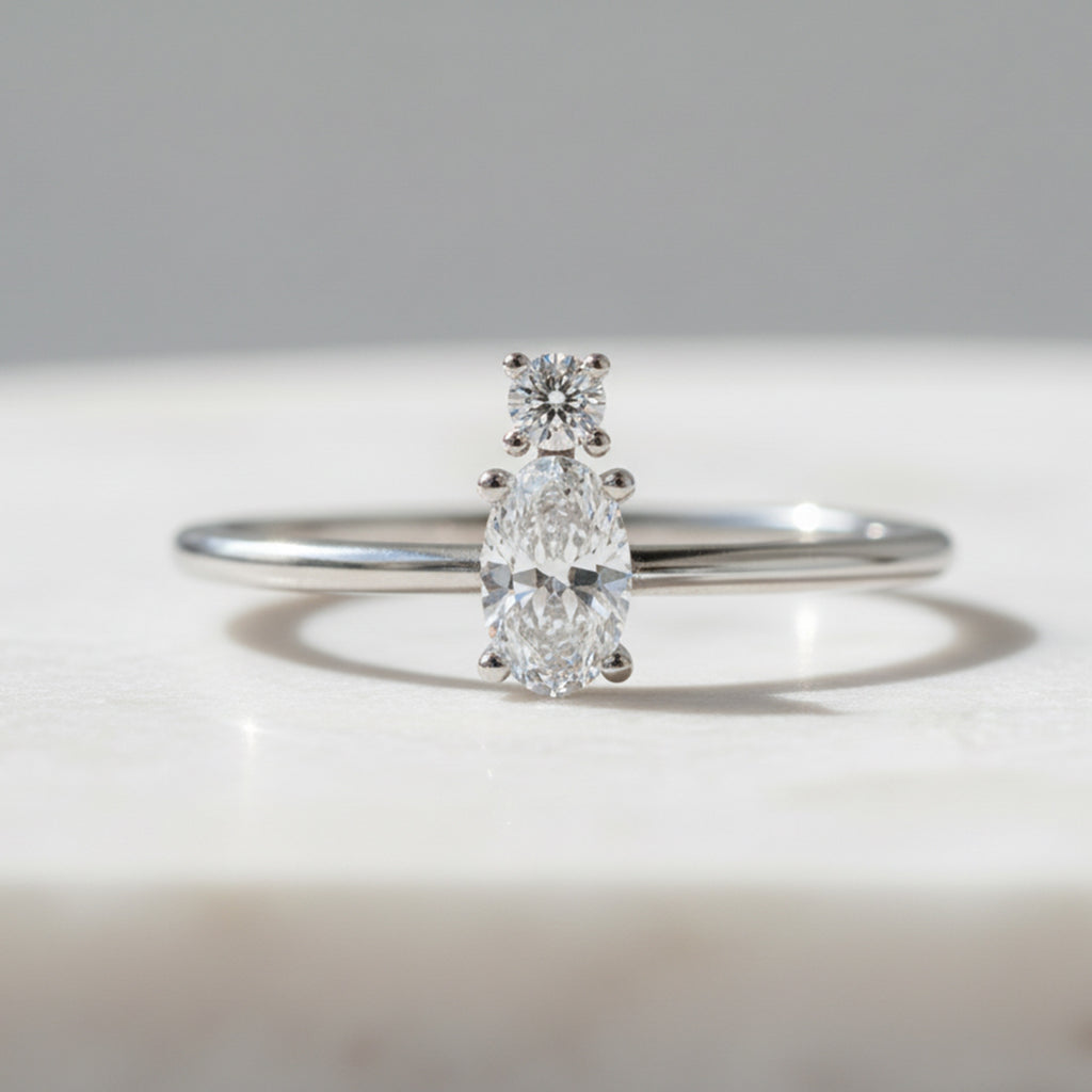 Oval Lab Grown Diamond Ring with Round Accent