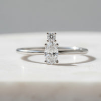 Oval Lab Grown Diamond Ring with Round Accent