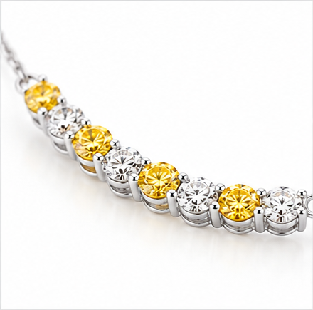 Yellow and white diamond curved line necklace angled close-up