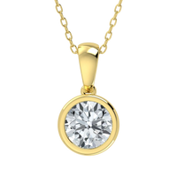 Gold necklace with a round diamond pendant on a white background