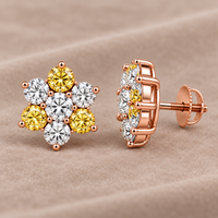 Side view of rose-gold mixed yellow and white diamond floral cluster screw-back earrings