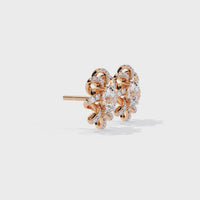 Encantadores aretes con diamantes cultivados en laboratorio y diseño floral en espiral